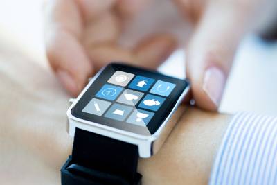 Image of wrist wearing smart watch.