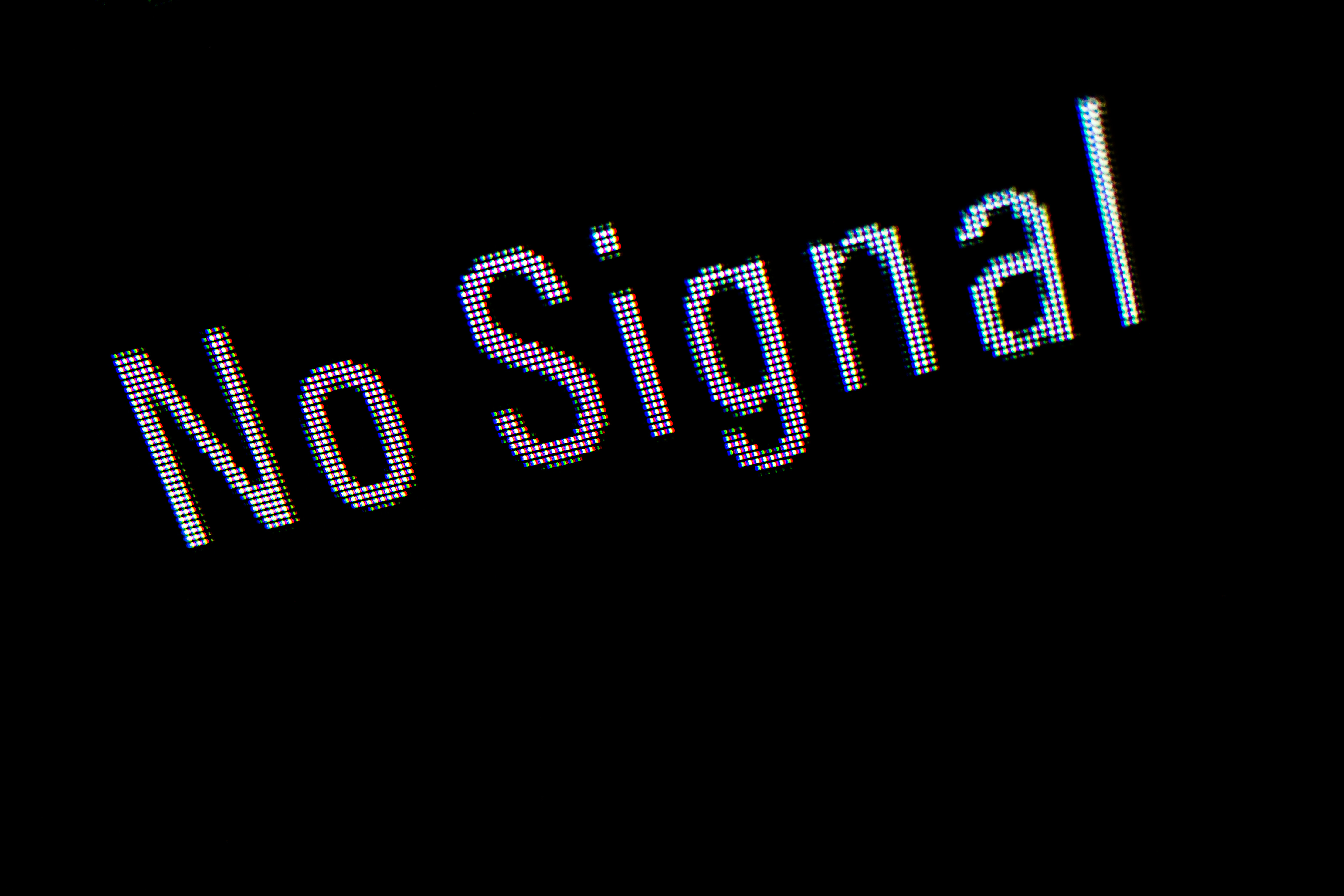 Digital text reading "No Signal"