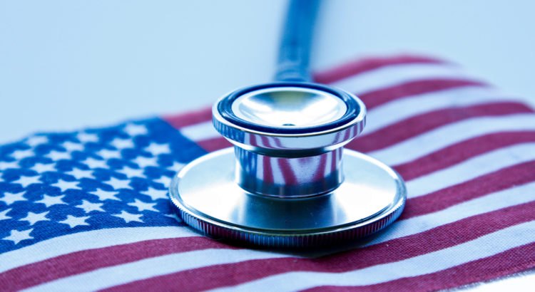 Close-up of a stethoscope on an American flag