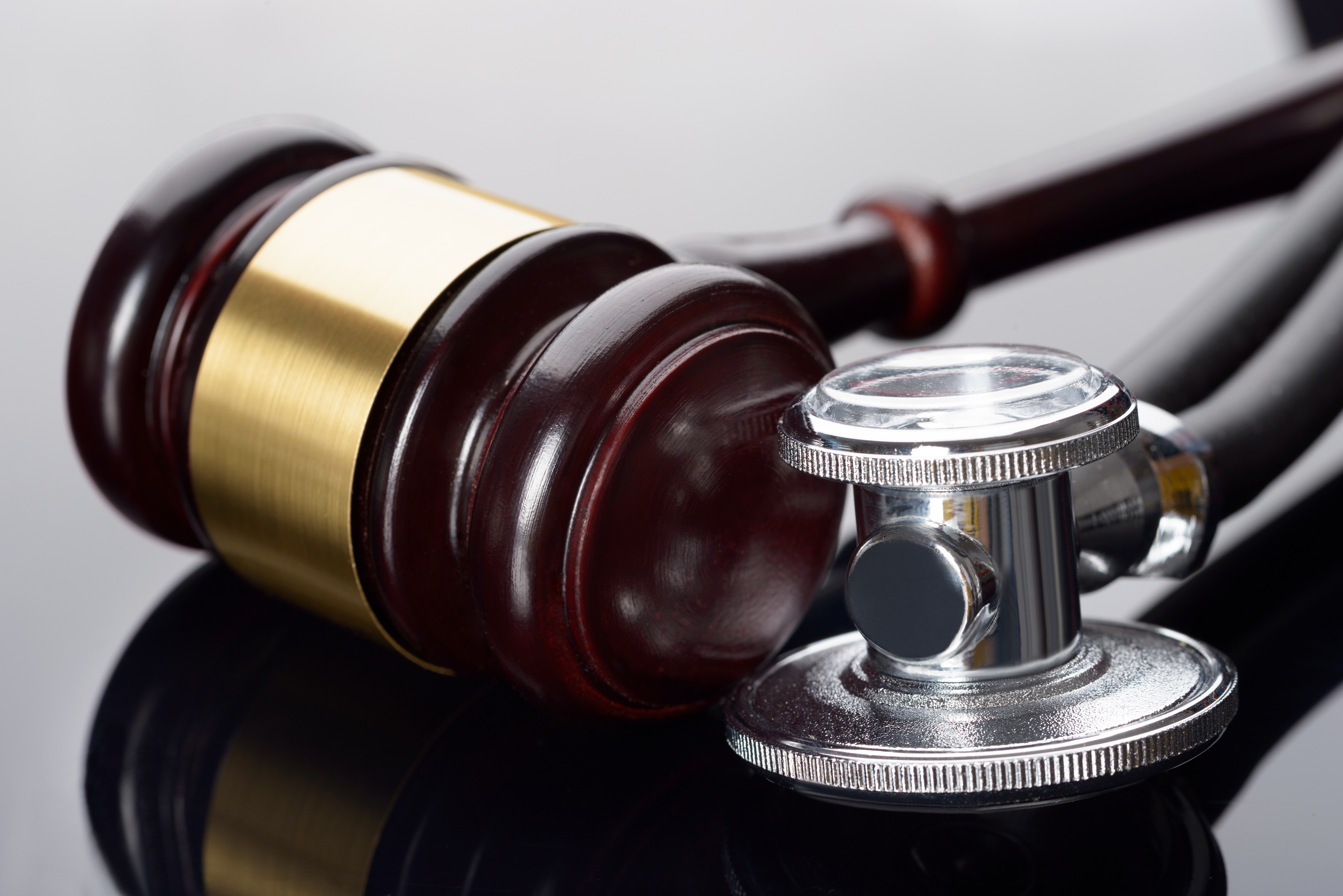 Gavel And Medical Stethoscope