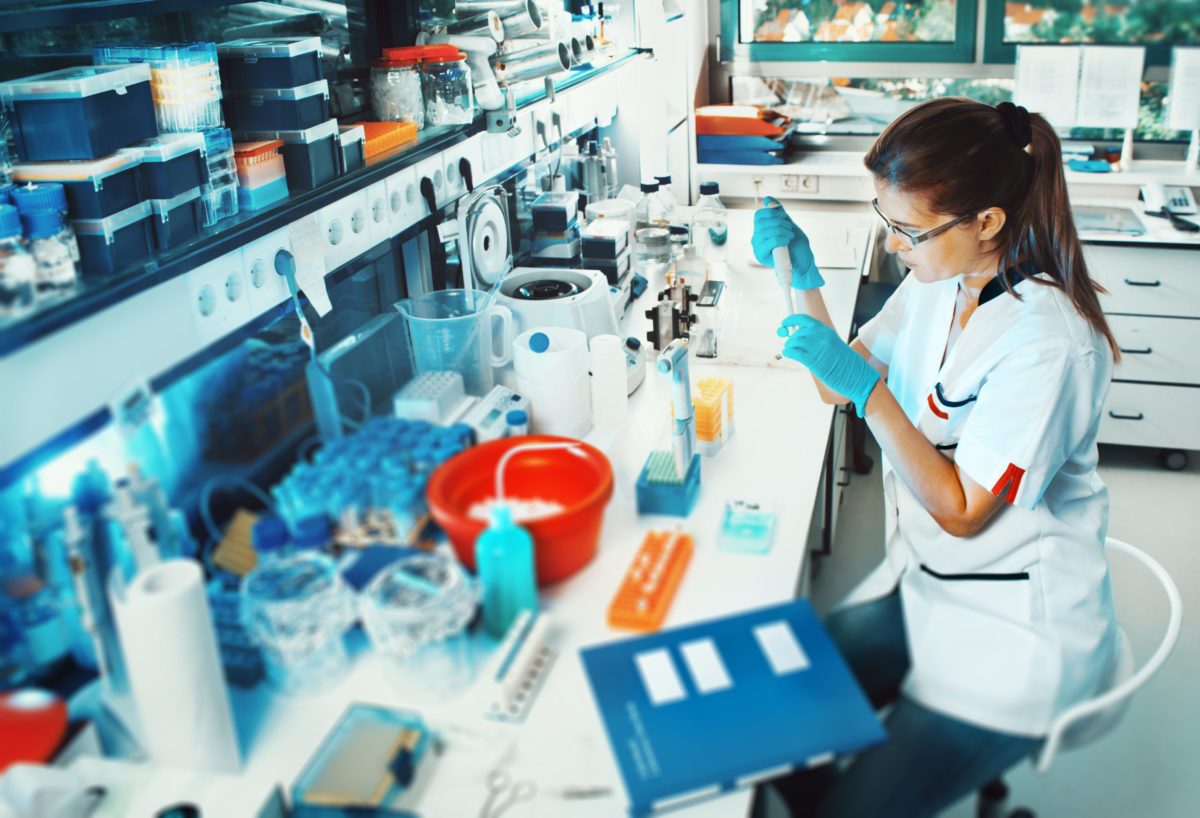 Researcher works at a lab bench