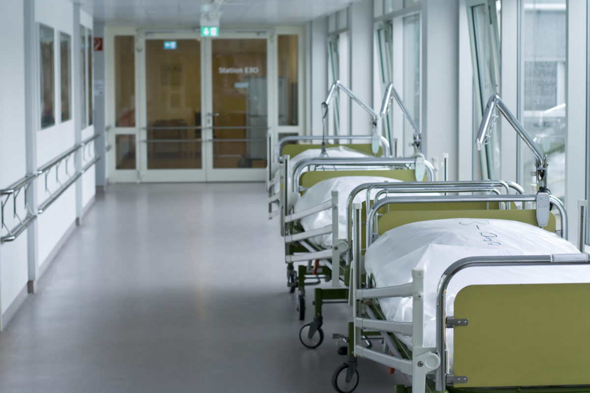 corridor with hospital beds