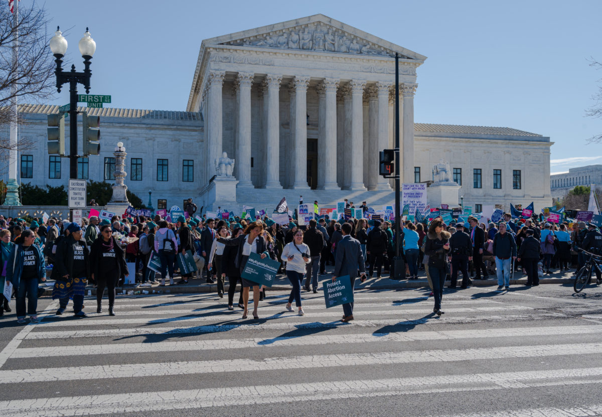 Washington, DC, USA -- March 4, 2020. Wide angle photo of a throng of protesters at an abortion rights rally in front of the Supreme Court.