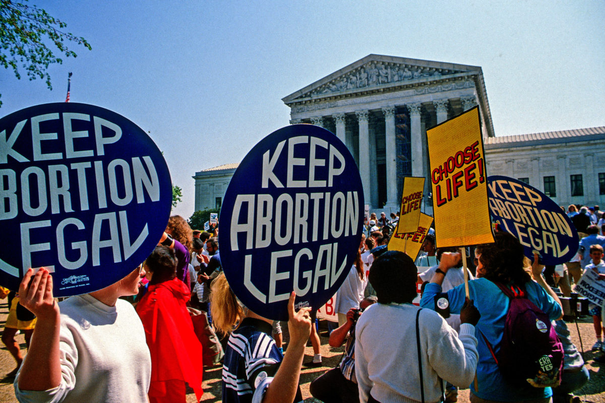 Washington DC.,USA, April 26, 1989. Supporters for and against legal abortion face off during a protest outside the United States Supreme Court Building during Webster V Health Services.