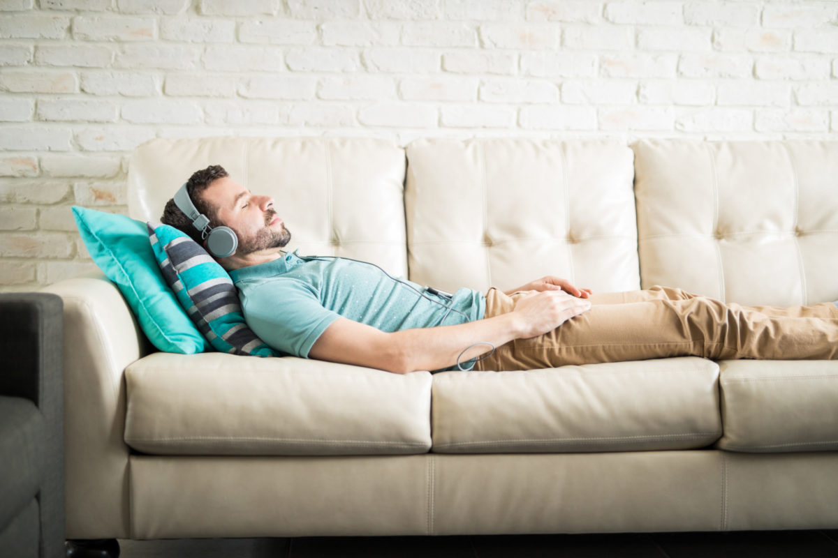 man lying on couch.