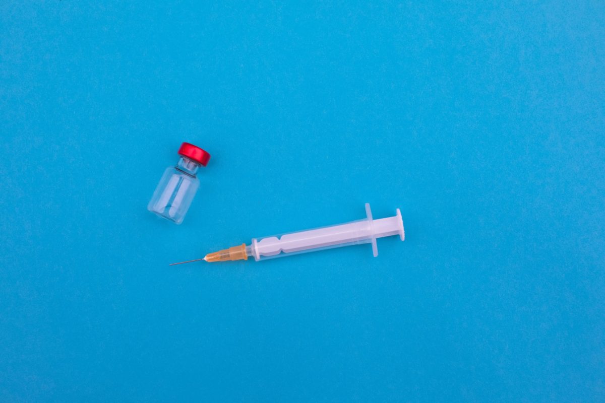 Vial and syringe.