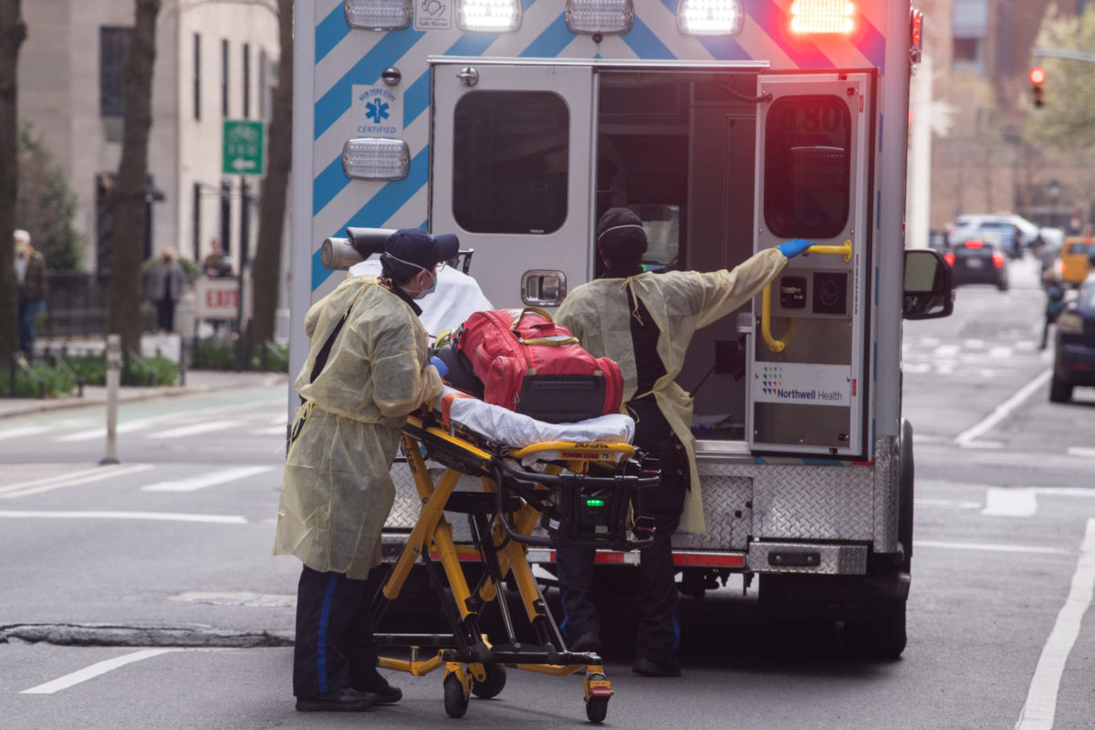 NEW YORK, NEW YORK - APRIL 05: Emergency medical technician wearing protective gown and facial mask amid the coronavirus pandemic on April 5, 2020 in New York City.