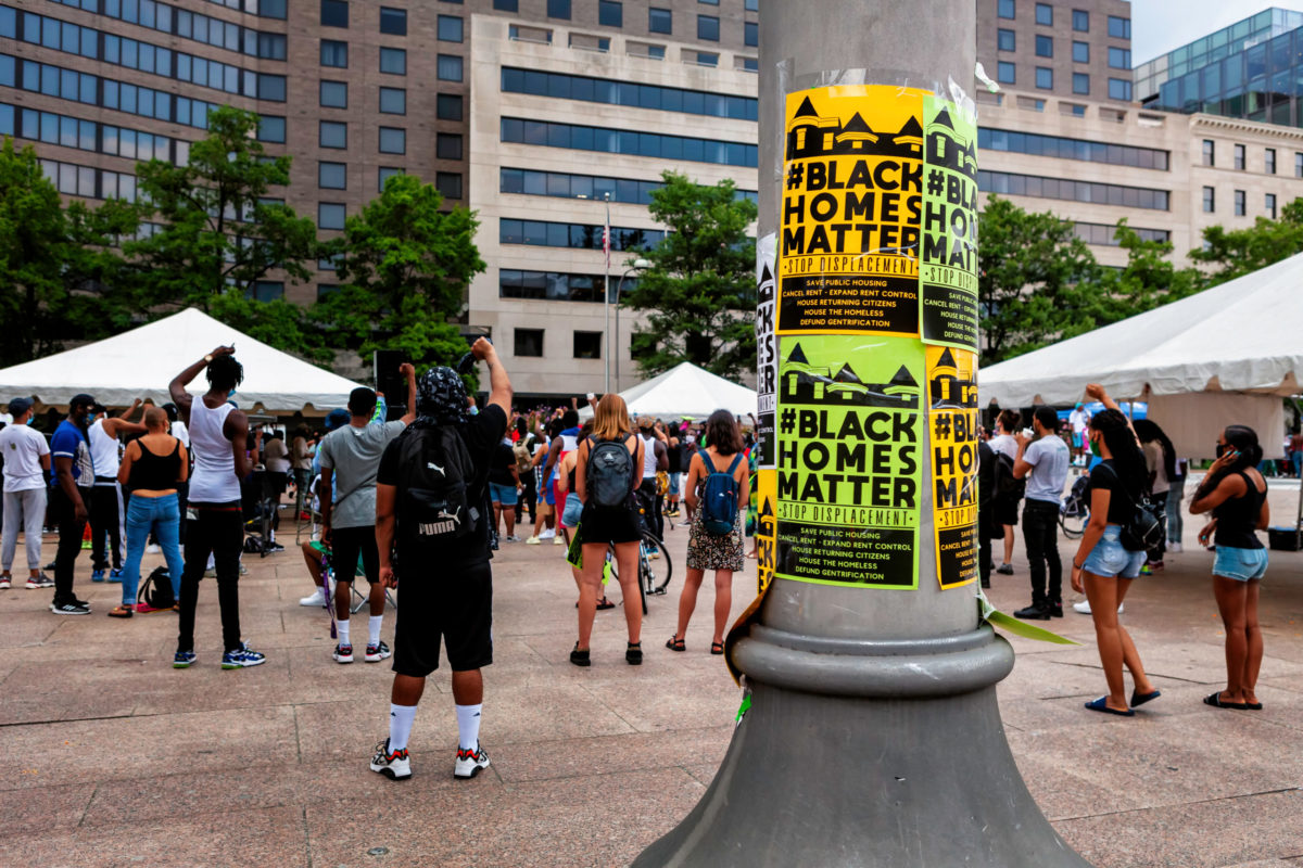 Washington, DC, USA - July 6, 2020: Protesters rally for housing as a human right at Black Homes Matter rally at Freedom Plaza, organized by Empower DC.