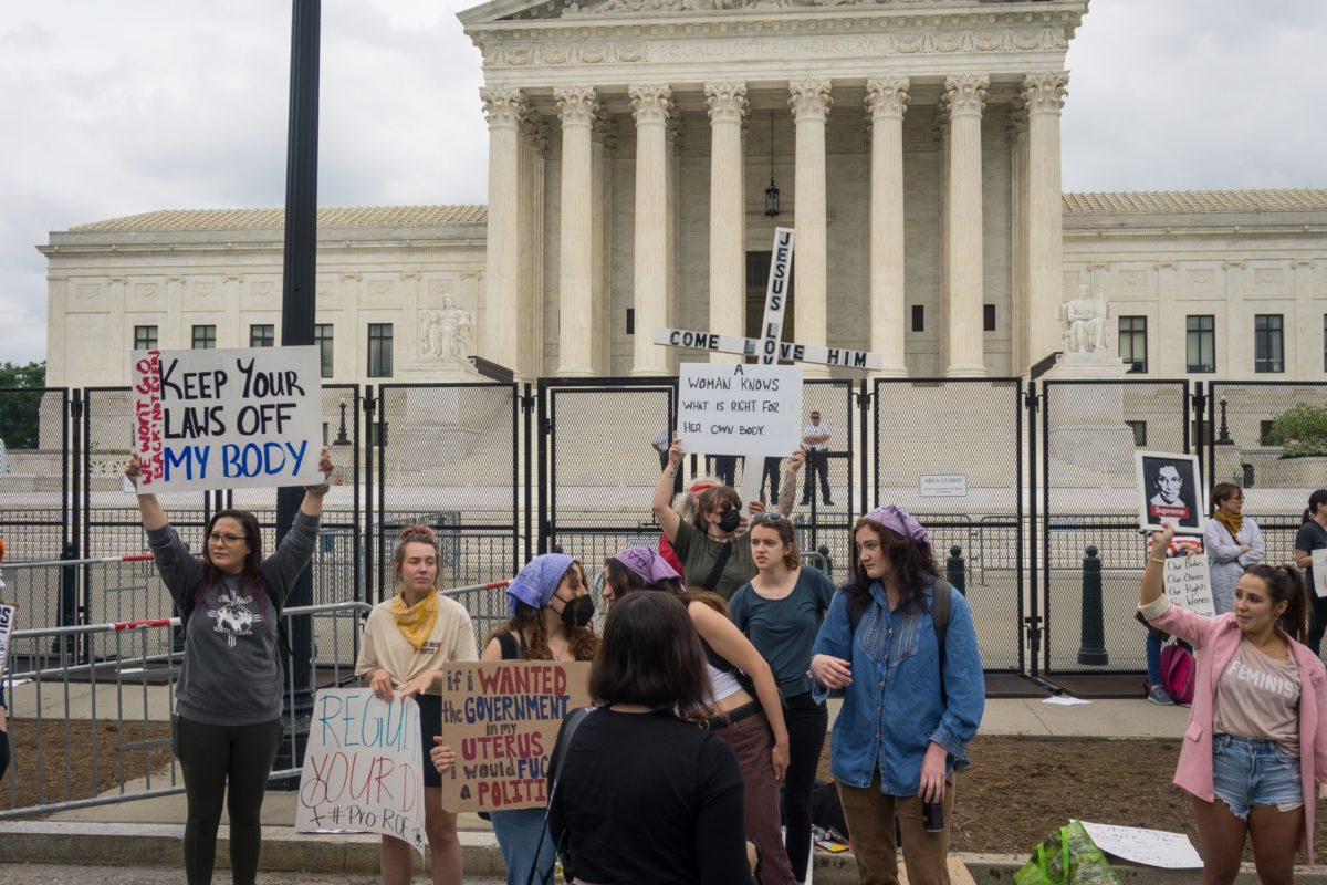 Washington, DC, USA, May 5, 2022: people protest the leaked draft Supreme Court opinion overturning Roe v. Wade and the right to abortion