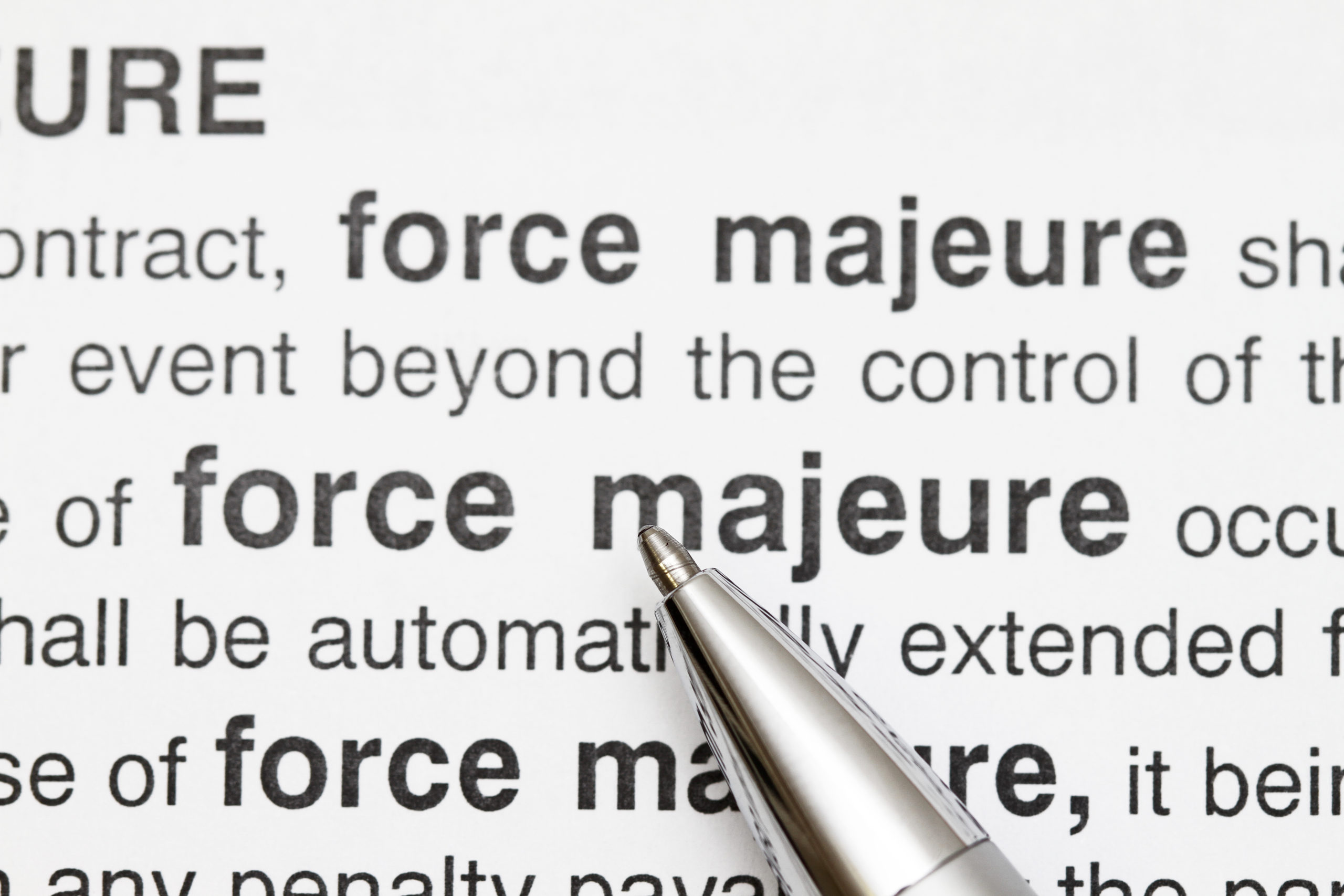 Bill of Health - silver pen resting on text reading "Force Majeure," unexpected event, pandemic