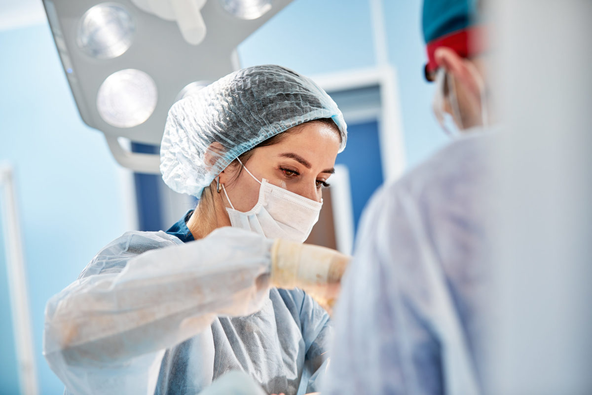 Surgeon at work in the operating room.