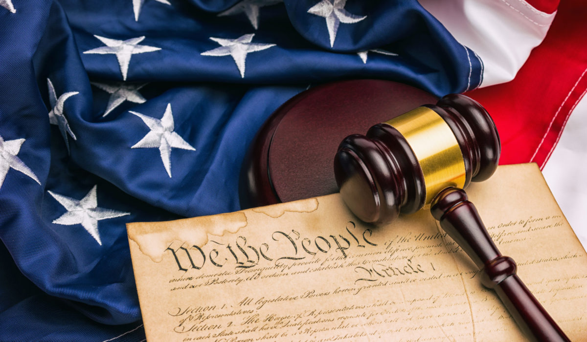 American Constitution - We the people with US Flag and gavel.