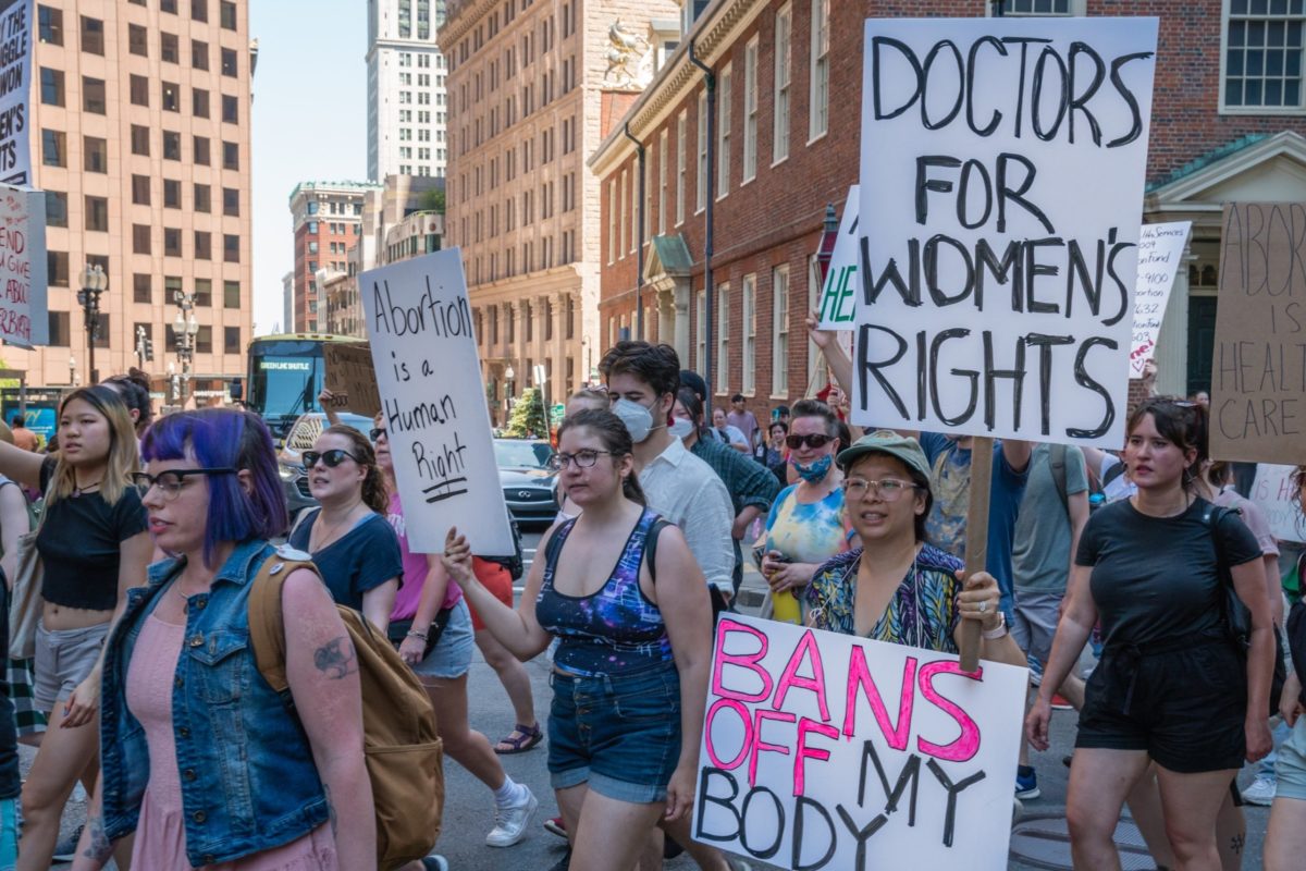 Boston, MA, US-June 25, 2022: Protests holding pro-abortion signs at demonstration in response to the Supreme Court ruling overturning Roe v. Wade.