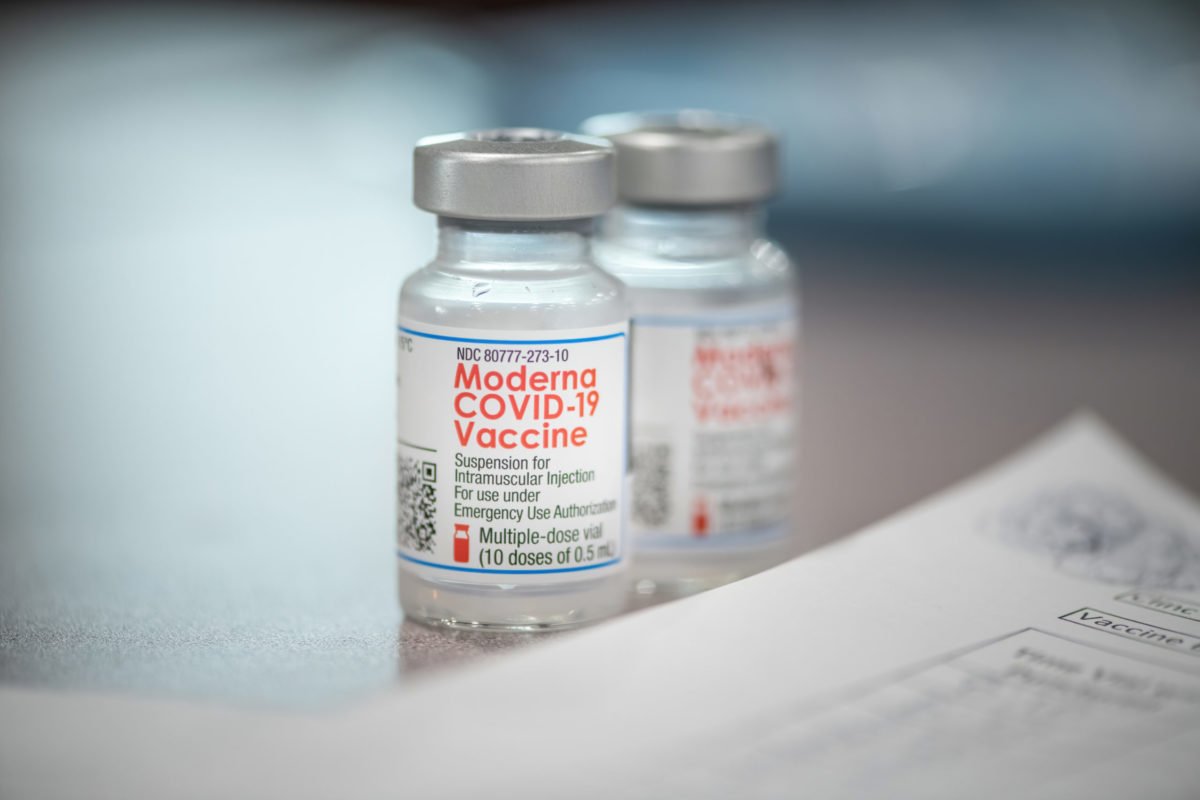 Grayslake, IL - January 30, 2021: Drive-through indoor COVID-19 vaccination facility at the Lake County Fairgrounds in Grayslake. The facility is dispensing both the Moderna and Pfizer vaccine.