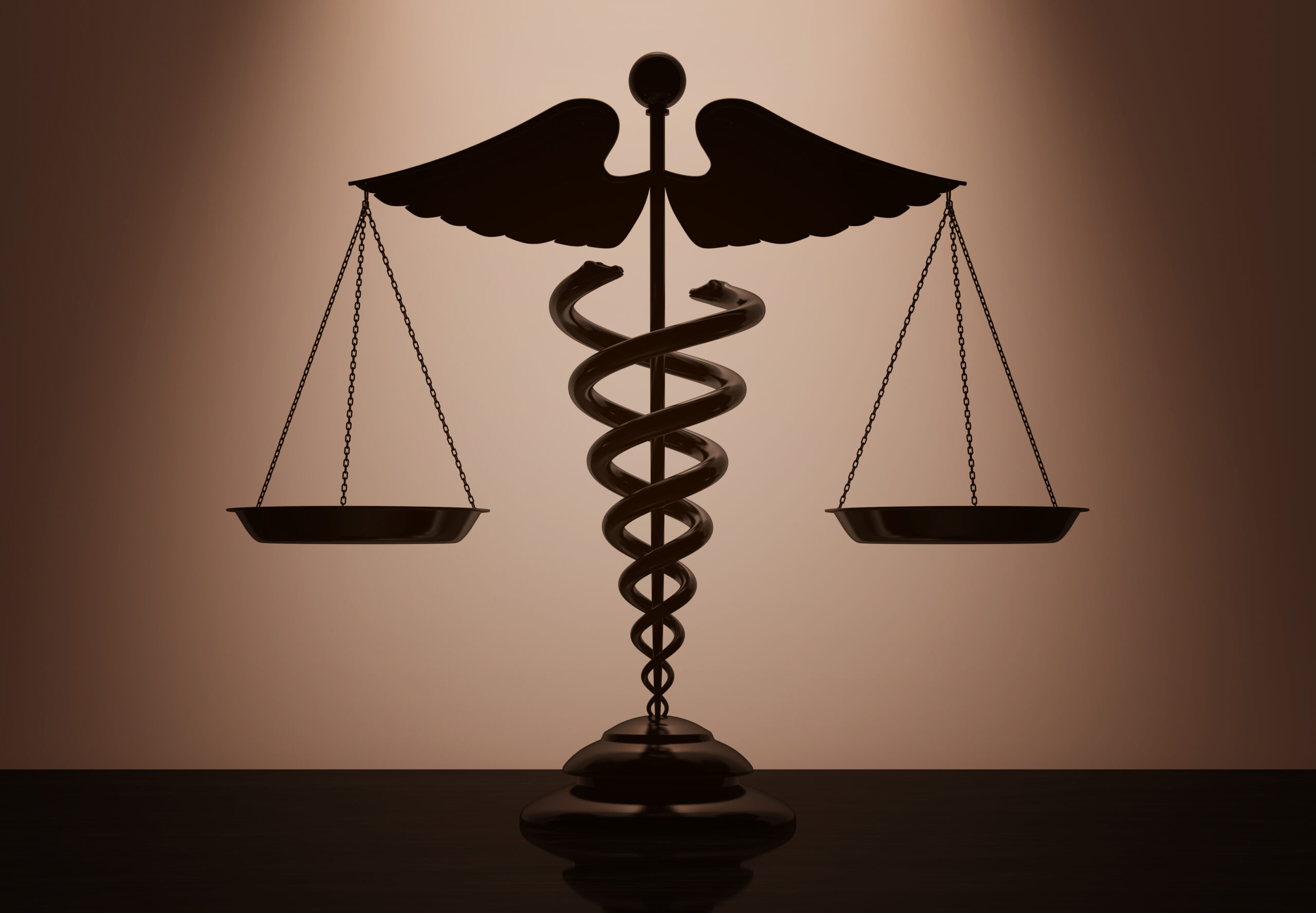 Medical Caduceus Symbol as Scales with backlight over Wall in dark room.